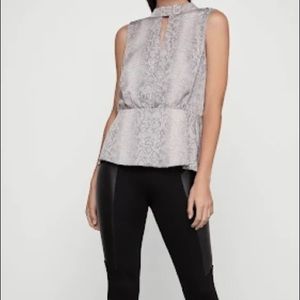 Bcbg Max Azria peplum top. Very stylish.